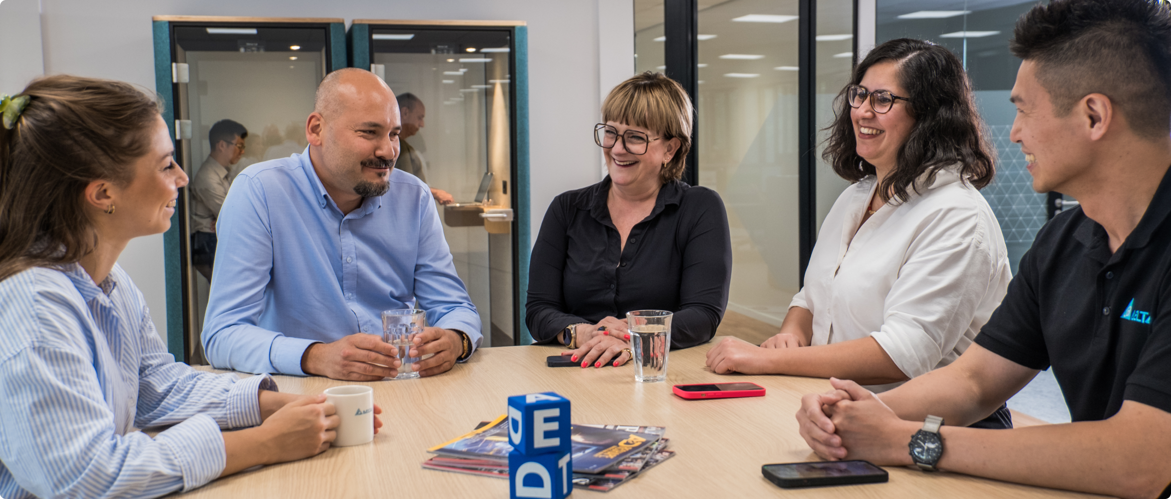 Colleagues collaborating at a meeting table