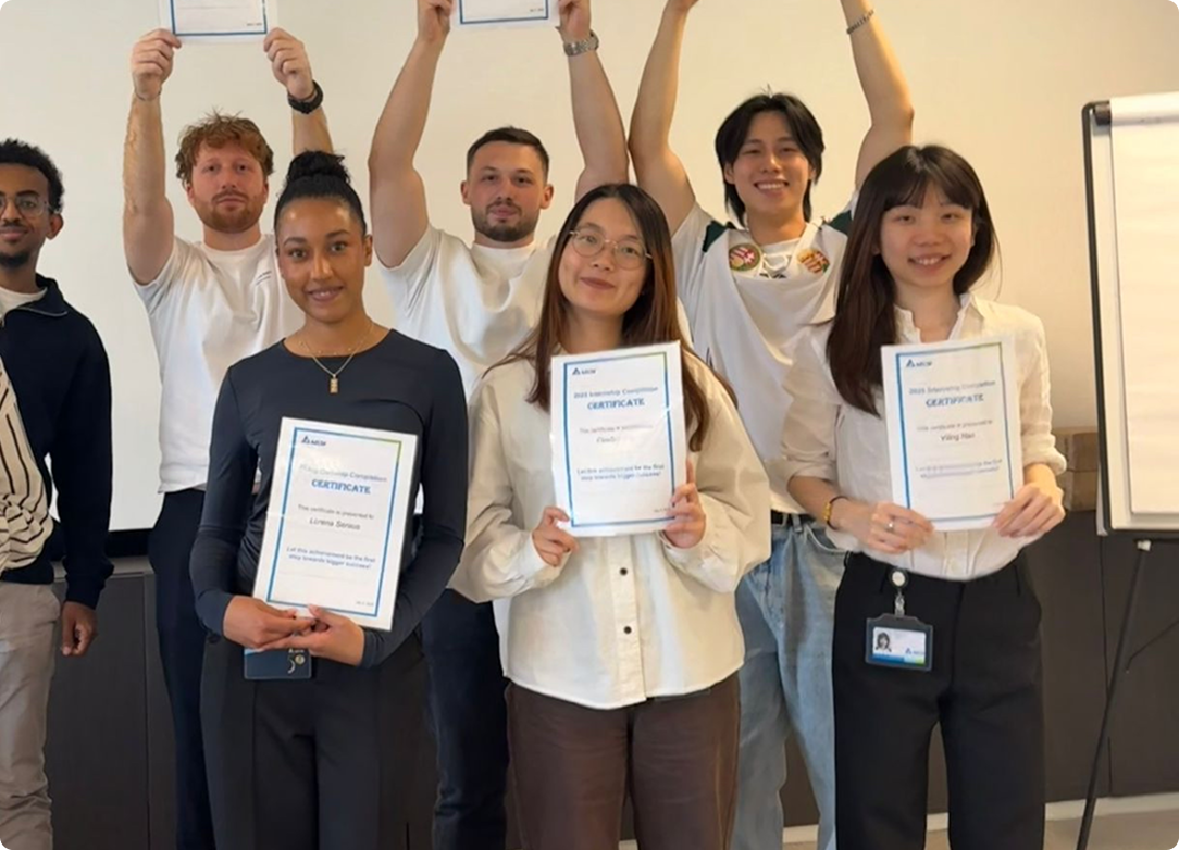 Lorena and fellow Delta interns holding certificates