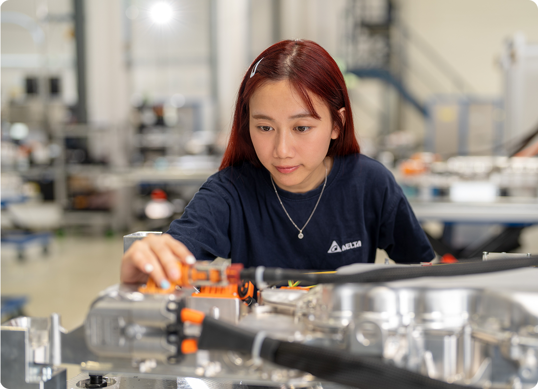 Delta employee working on an electronic assembly