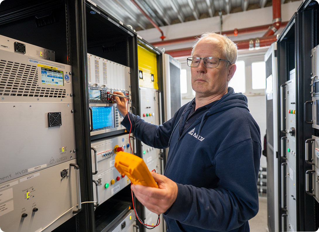 Delta technician testing equipment in a lab